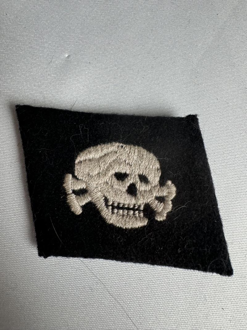 Totenkoph from Dachau unif. removed black rayon machine stitch in silver thread